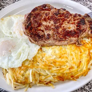 Ribey steak (10oz), eggs, hash browns
