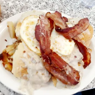 Bacon, biscuits/gravy, eggs, and potatoes