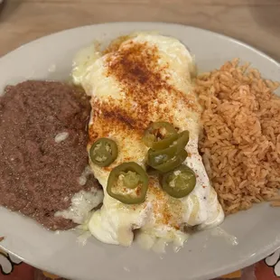 Chicken enchiladas with sour cream sauce.
