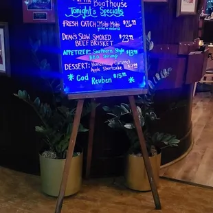 a neon sign in the lobby