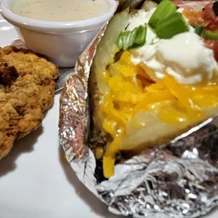 Texas Baked Potato with Chicken Fried Steak and White Gravy!! Tha double Best!!