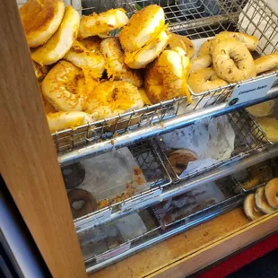 Fresh variety of bagels and muffins