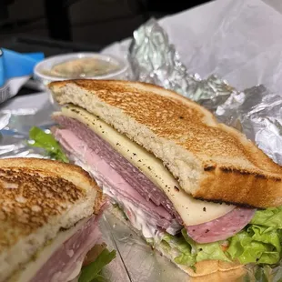 Ham, salami, provolone on white lightly toasted.