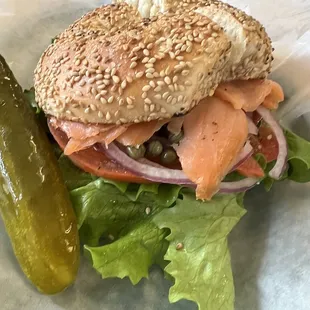 A whole meal. Liz bagel comes with lettuce tomato onion and capers with a pickle