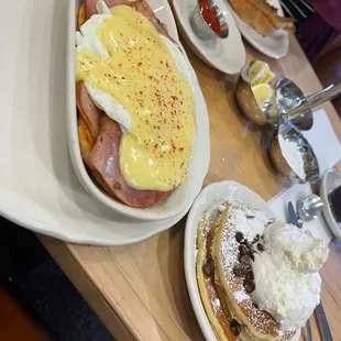Original eggs Benedict and chocolate chip pancakes