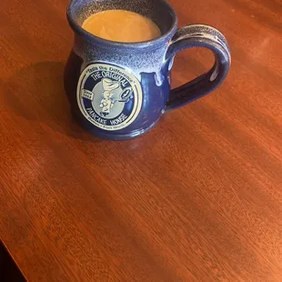 Signature handcrafted, kiln-fired coffee mug.