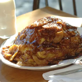 Oven baked Apple Pancake with cinnamon sugar glaze.