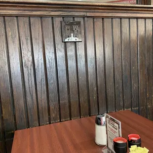 Some booths by the wall have outlets including usb