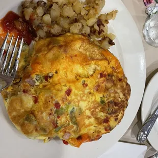Western Cheddar Omelette (with the potatoes from my daughter's kids meal)