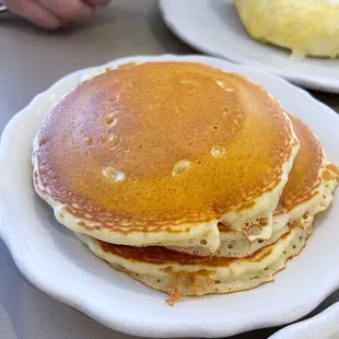 Buttermilk pancakes that come with the omelette (Swiss Oven Omelette in the background)