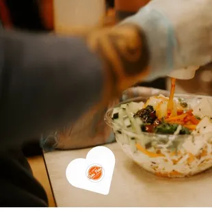 Preparing a poki Bowl