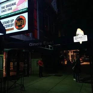 a neon sign for a pizza restaurant