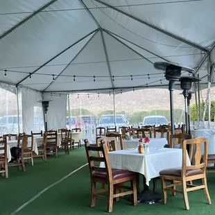 a restaurant with tables and chairs