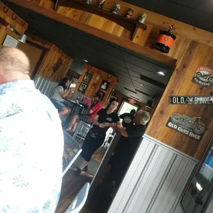 a barber cutting a customer's hair