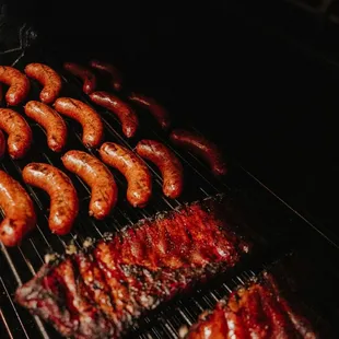 Our Sausage and St. Louis Ribs almost ready to be served.