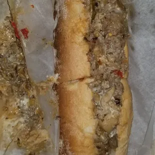 Cheesesteak with grilled peppers, onions and mushrooms
