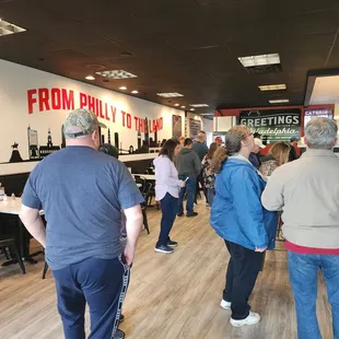 a large group of people in a restaurant