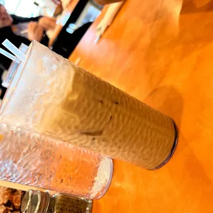 a tall glass of iced coffee