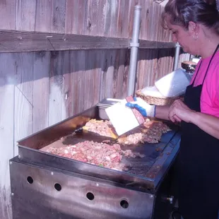 Laurie hard at work on the grill...