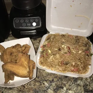 Six piece wings with house fried rice.