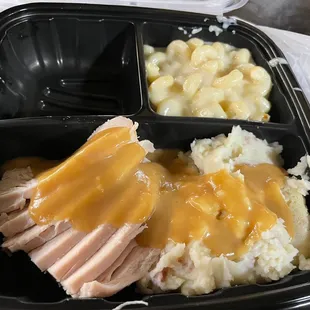 Turkey with potatoes and Mac and cheese