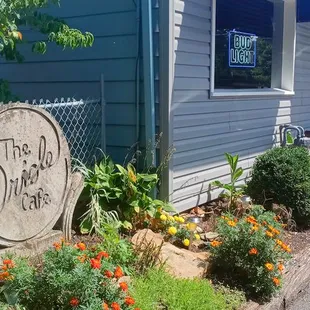 a sign in front of the building