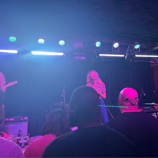 a band performing on stage