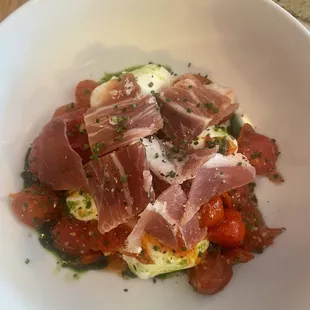 Buratta with tomato and procuitto