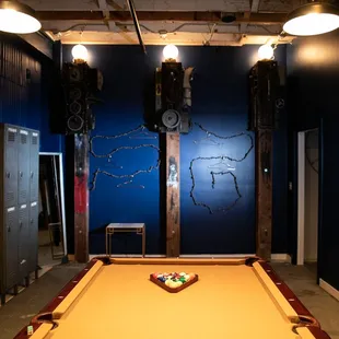 Groom's Room - complete with pool table, lounge area, and movie projector.