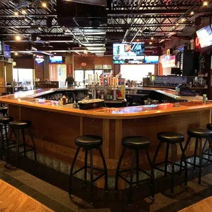 Bar Area with Half of the Seating Area and Patio Beyond