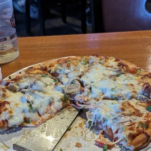 FOUR STAR pizza Pepperoni, Italian sausage, mushrooms, green peppers and mozzarella cheese.