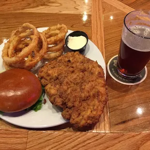 Pork tenderloin with house cut onion rings.