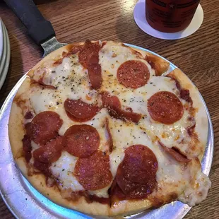 Double pepperoni small pizza was good but nothing special .