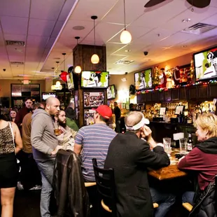 people sitting at the bar