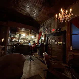 a bar with a chandelier