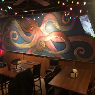 an octopus mural on the wall