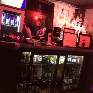 Behind the bar.