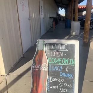 The entrance isn't too fancy- it that last door up there.