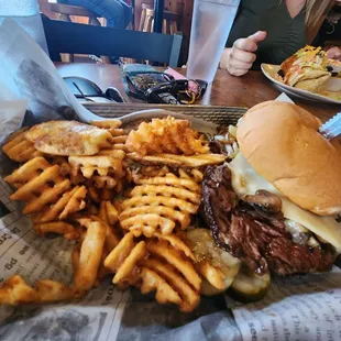 a basket of fries and a sandwich
