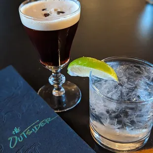 two cocktails on a table