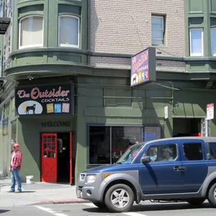 a car parked in front of a building