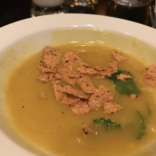 Pro move to take your Mulligatawny soup to the next level: sprinkle in a little crushed papad from your appetizer platter!