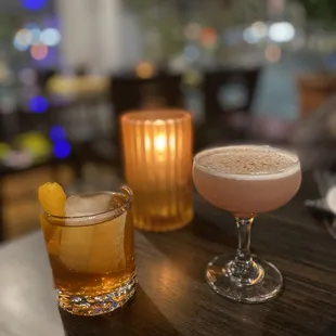 two cocktails on a table
