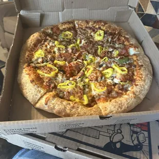 Large Everything Pizza, minus black olives, well done, light sauce