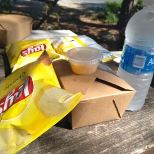 Meal comes with drink and chips.