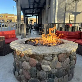 a fire pit on a patio