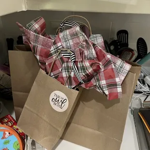 They offer complimentary wrapping on your purchases with themed tissue paper.  This one is for Christmas!