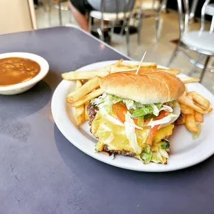 a burger and fries on a plate
