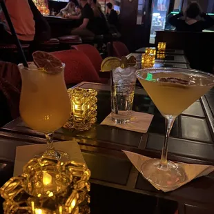 two cocktails on a bar table