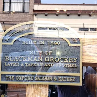 a sign for the blackman grocery